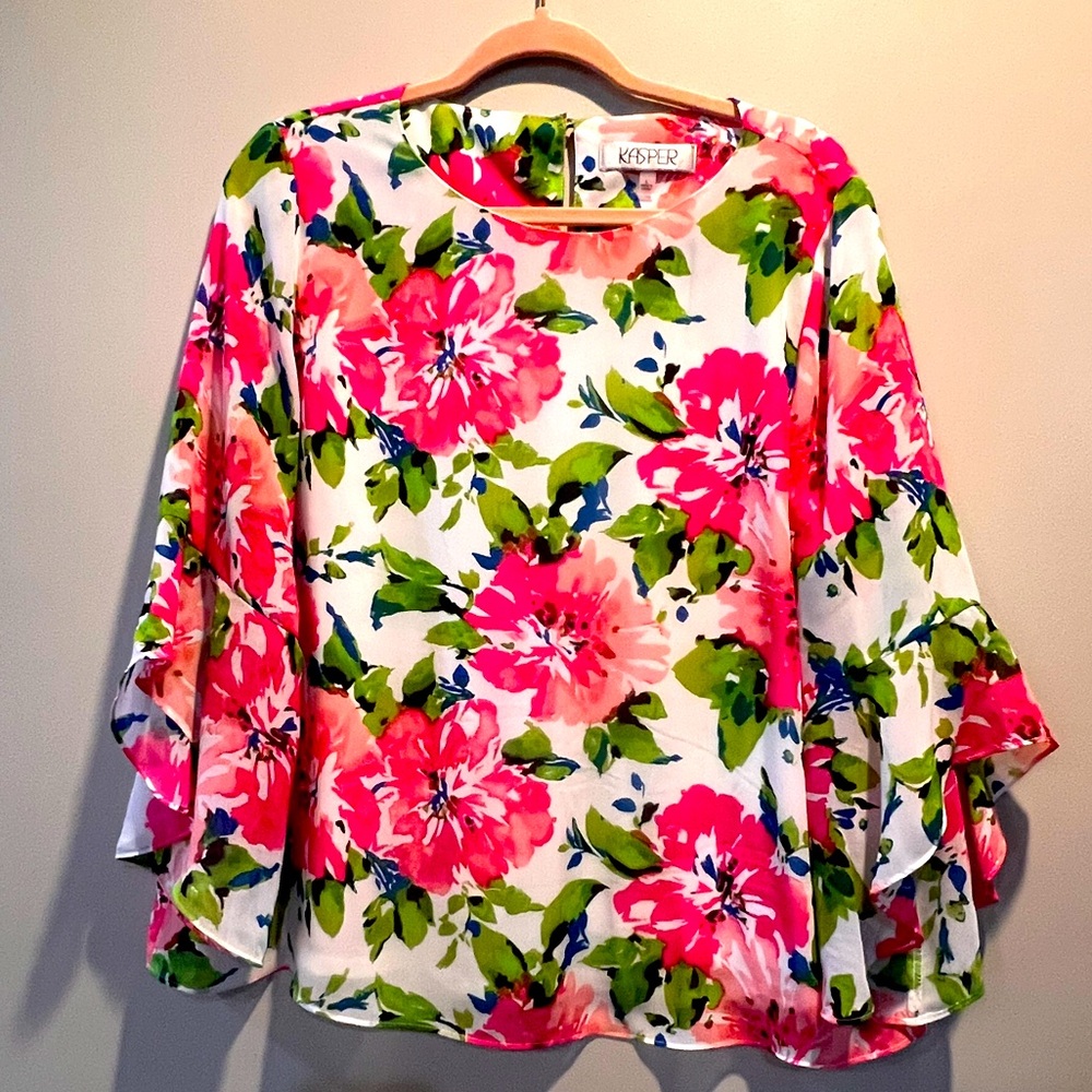 Large 3/4-length flutter sleeves lend a fashionable flourish to Kasper's sweet f